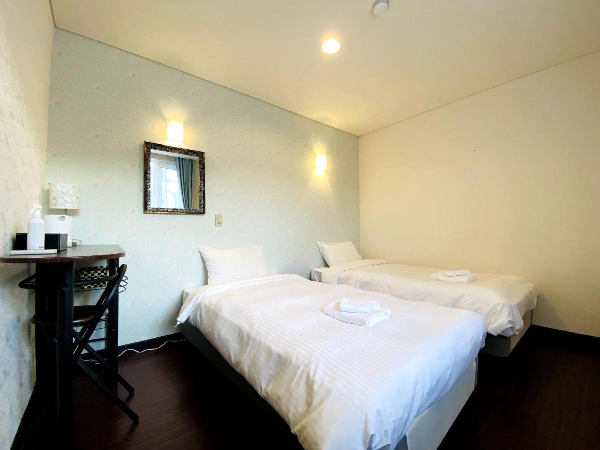 Petit Hotel Melon Furano Exterior photo