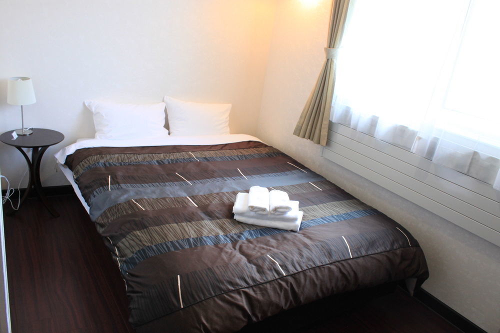 Petit Hotel Melon Furano Exterior photo