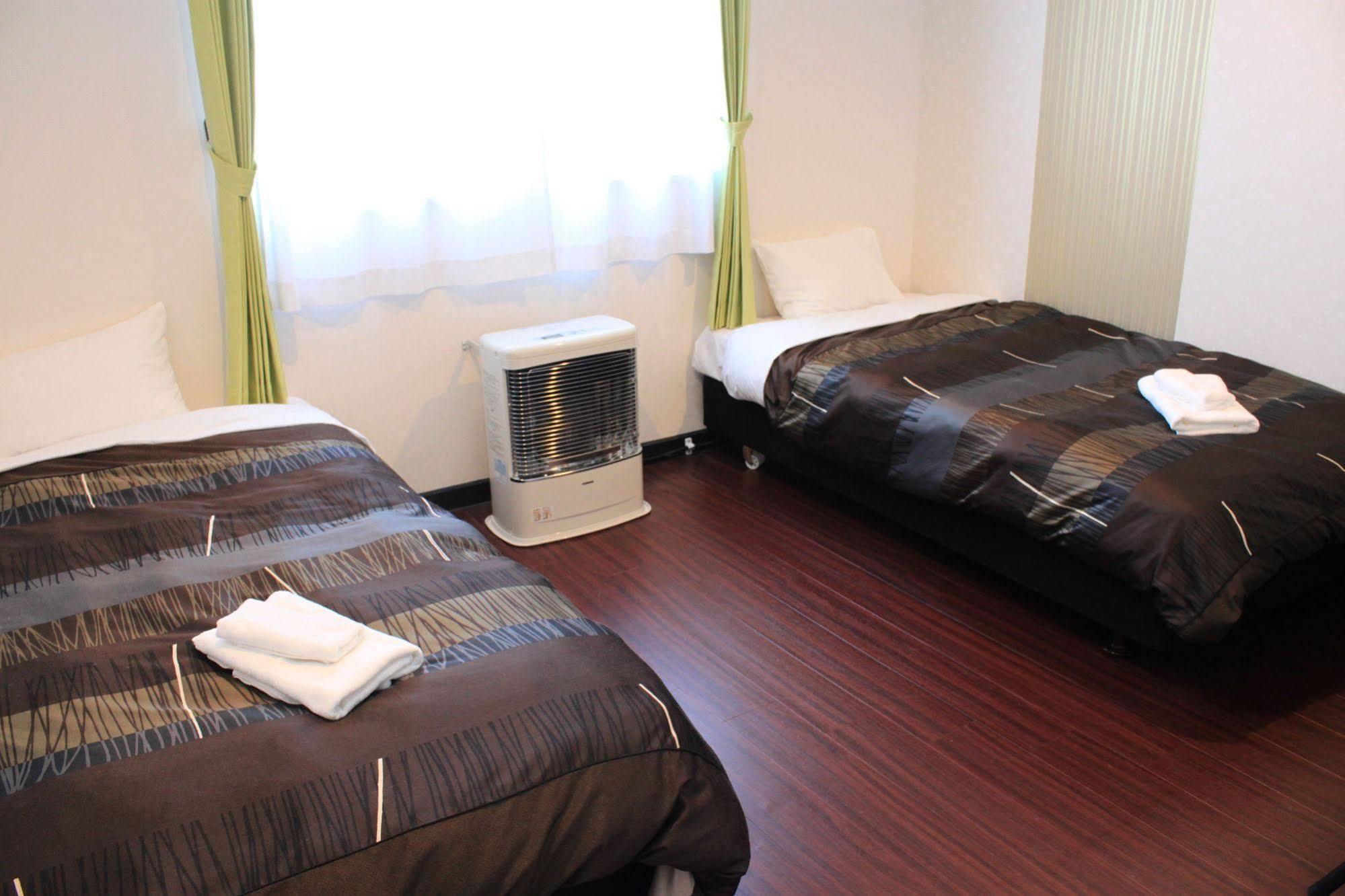 Petit Hotel Melon Furano Exterior photo
